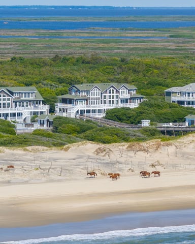 Outer Banks luxury estates on the 4x4 beach