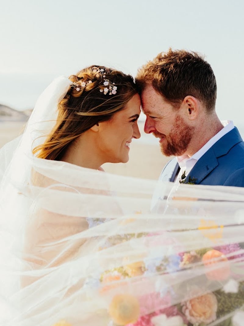 Bride and groom, foreheads together