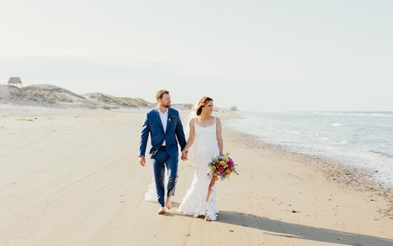 Couple walking the shoreline