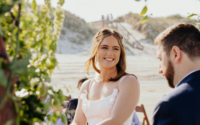 Bride and groom golden hour beach